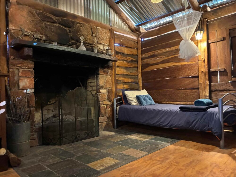 Bush Cottage fire place and interior at Ooraminna Homestead